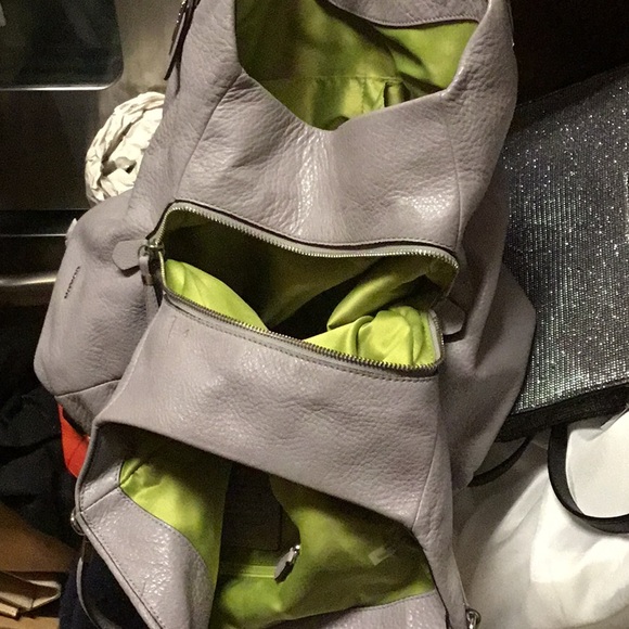 5 storage area like new leather Coach.   Second like it.  The other diff color. - Picture 5 of 5